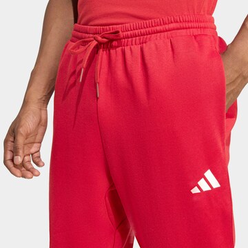 ADIDAS SPORTSWEAR Tapered Workout Pants in Red