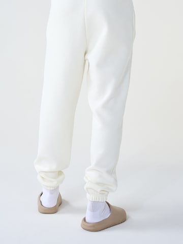 ABOUT YOU x Dardan Loose fit Trousers 'Sammy' in White