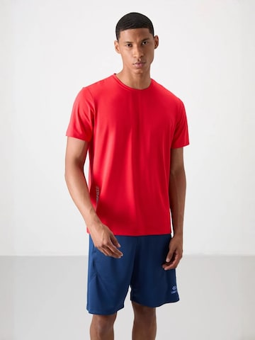 T-Shirt fonctionnel Tommy Life en rouge