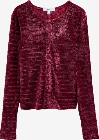 sarkans Next Adīta jaka: no priekšpuses