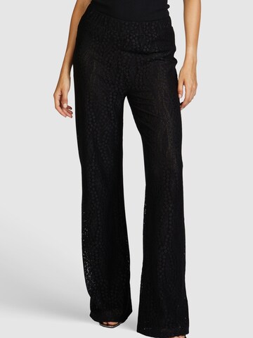 MARC AUREL Flared Pants in Black: front