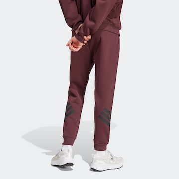Tapered Pantaloni sportivi 'FI' di ADIDAS SPORTSWEAR in rosso