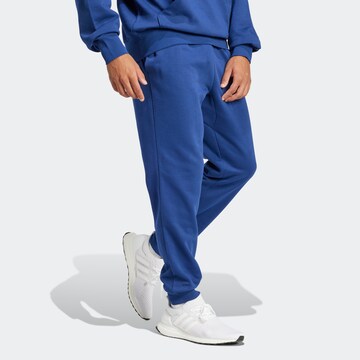 Effilé Pantalon de sport 'FEELCOZY' ADIDAS SPORTSWEAR en bleu
