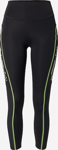 UNDER ARMOUR - Skinny Calças de desporto em preto: frente