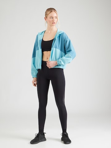 Veste de sport 'Rival' UNDER ARMOUR en bleu