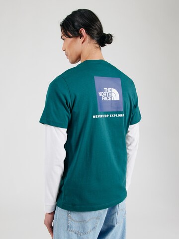 THE NORTH FACE Koszulka 'REDBOX' w kolorze zielony: przód
