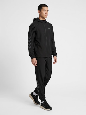 Hummel Regular Sports trousers in Black