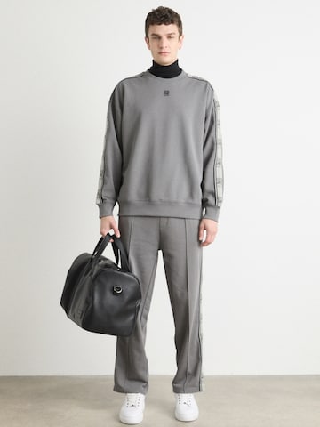 Loosefit Pantalon 'Dishorte' HUGO en gris