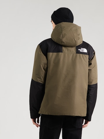 THE NORTH FACE Χειμερινό μπουφάν 'Mountain' σε πράσινο