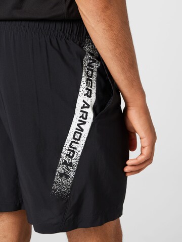 UNDER ARMOUR Regular Workout Pants in Black