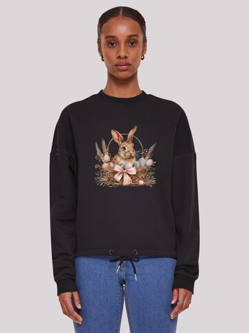 Sweat-shirt 'Osterhasen Korb Dekor' F4NT4STIC en noir : devant