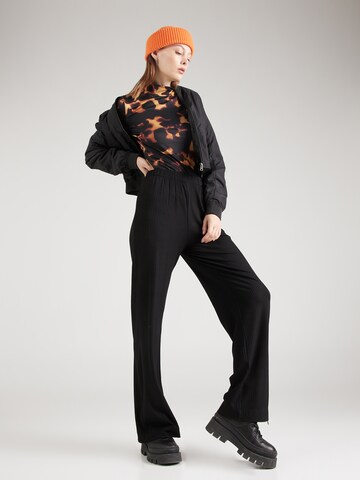 JAN 'N JUNE Wide leg Broek in Zwart