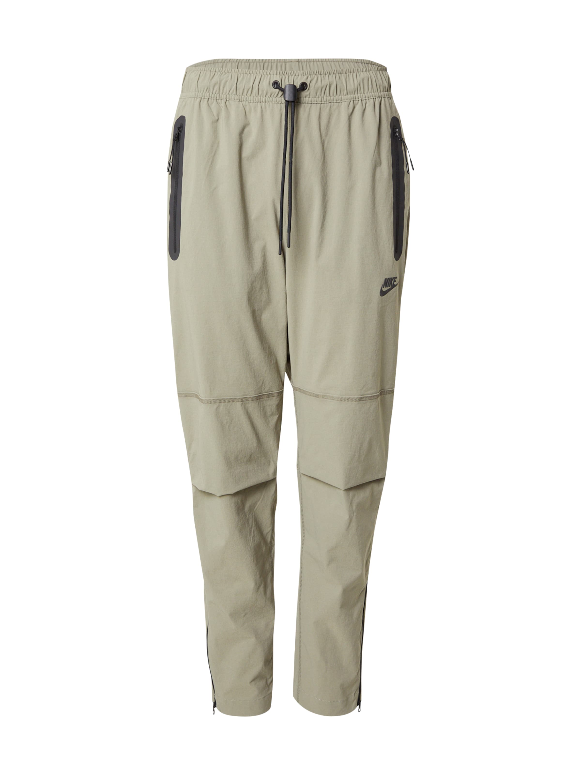 žalia Nike Sportswear Kelnės: priekis