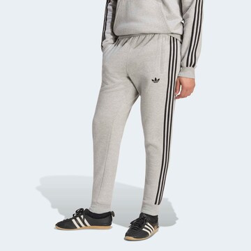 ADIDAS ORIGINALS Tapered Pants in Grey: front
