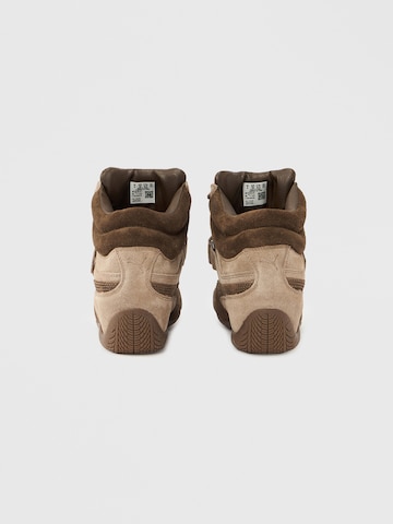 PUMA Sneakers hoog 'Speedcat Wedge' in Bruin