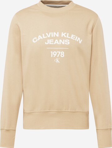 Sweat-shirt Calvin Klein Jeans en beige : devant