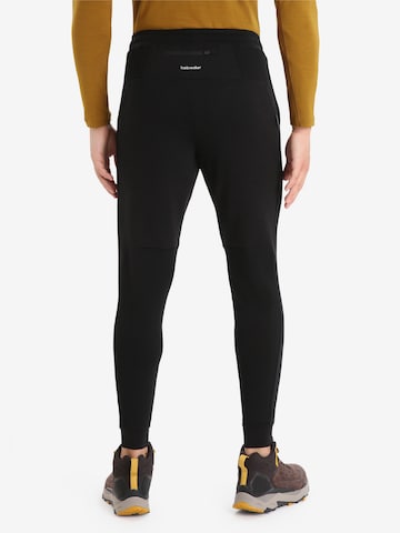 Skinny Pantalon de sport ICEBREAKER en noir