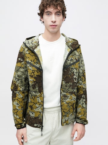 Nike Sportswear Between-season jacket 'TECH' in Green