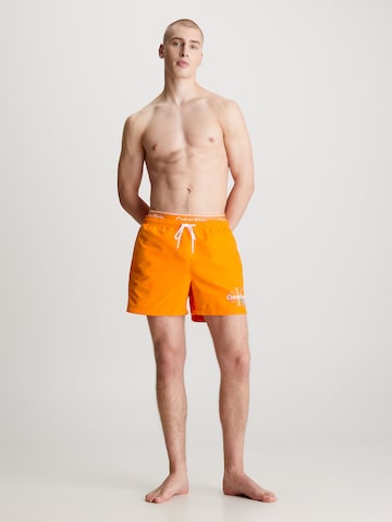 Calvin Klein Swimwear Board Shorts 'Pride' in Orange