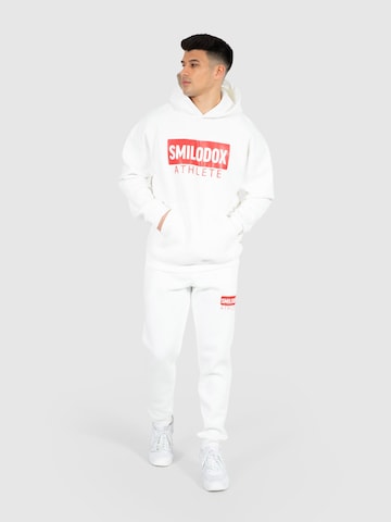 Effilé Pantalon de sport 'Athlete' Smilodox en blanc