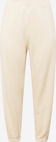 Public Desire Curve Tapered Pants in White: front