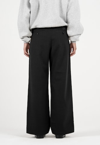 Prohibited Zvonové kalhoty Kalhoty – černá