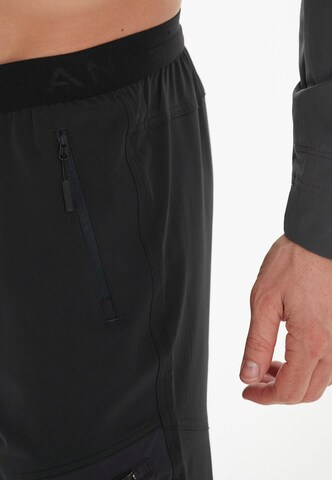 ENDURANCE Tapered Sports trousers 'Sparken' in Black