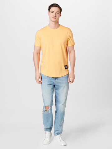 Calvin Klein Jeans - Camiseta en naranja