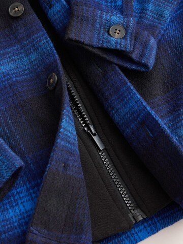Next Tussenjas in Blauw
