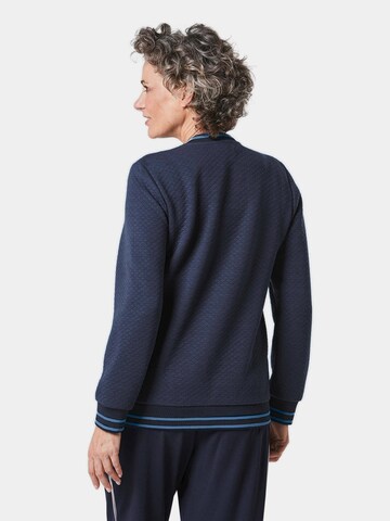 Goldner Jacke in Blau