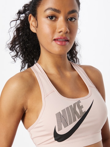 Nike Sportswear Bustier Sport bh in Roze