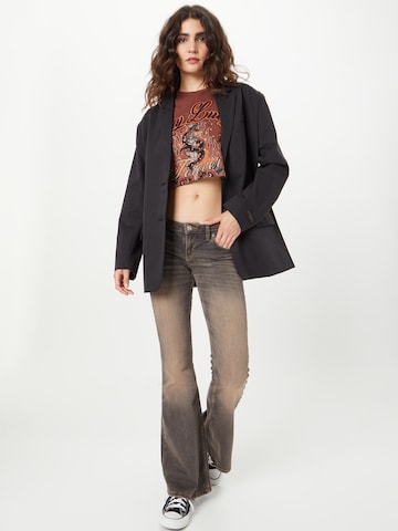 BDG Urban Outfitters - Top 'STAY LUCKY' em castanho