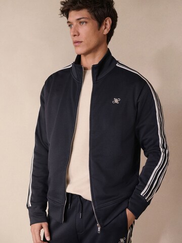 Veste de survêtement Next en bleu : devant