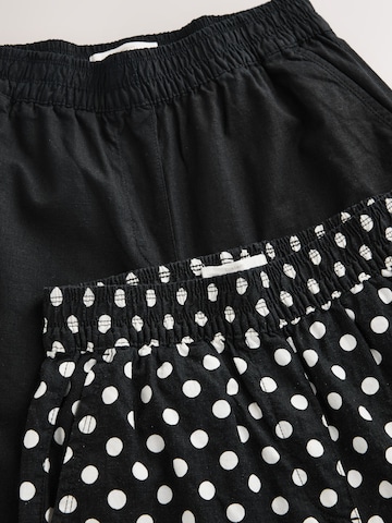 Next Zvonové kalhoty Kalhoty – černá