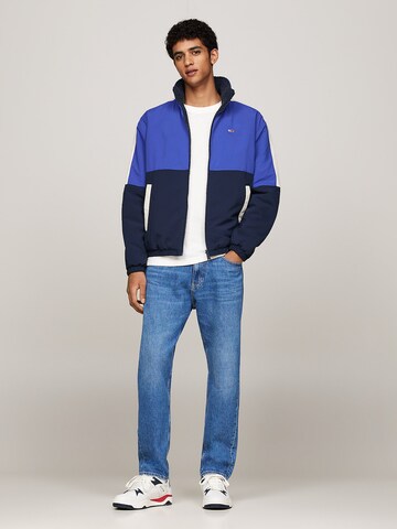 Tommy Jeans Between-season jacket 'Reversible' in Blue