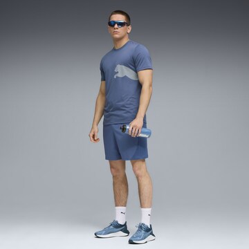 PUMA Functioneel shirt 'Train All Day' in Blauw