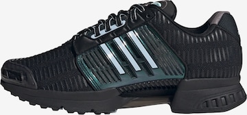 Baskets basses ADIDAS ORIGINALS en noir : devant