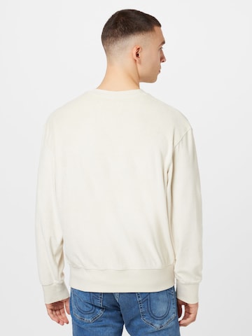 Sweat-shirt Calvin Klein Jeans en beige