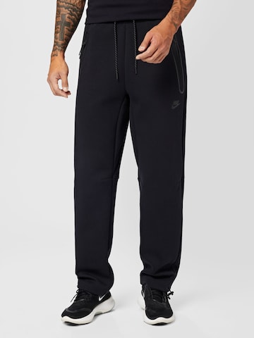 Regular Pantaloni de la Nike Sportswear pe negru: față