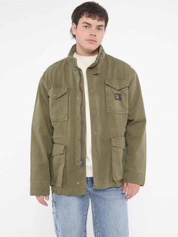 GUESS Between-Season Jacket in Green: front