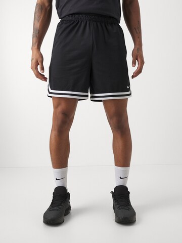 Loosefit Pantalon de sport Nike Sportswear en noir : devant