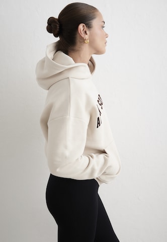 Sweat de sport Aim'n en beige