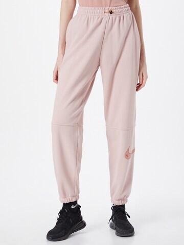 Nike Sportswear - Tapered Calças em rosa: frente