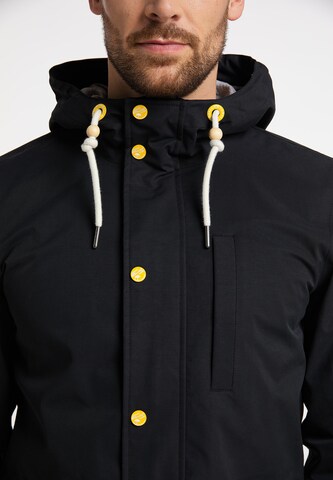 Schmuddelwedda Between-seasons parka in Black