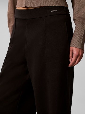 Calvin Klein Regular Pleat-Front Pants in Black