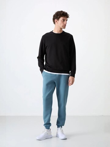 Tommy Life Sweatshirt in Black