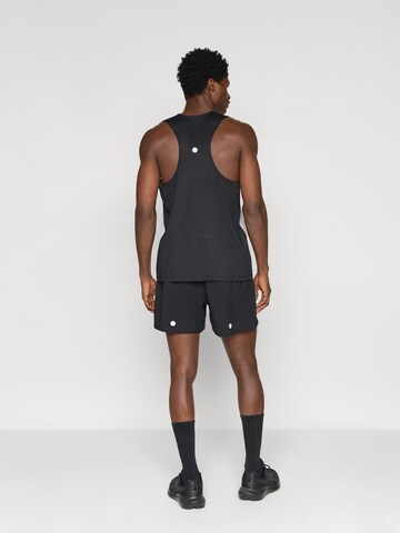 juoda ASICS Standartinis Sportinės kelnės 'Fujitrail'