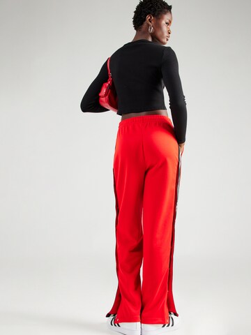 Loosefit Pantaloni 'Necendia' di HUGO in rosso