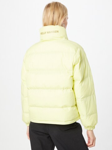 HELLY HANSEN - Casaco de inverno em amarelo