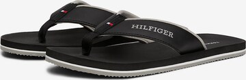 TOMMY HILFIGER Teenslippers in Zwart